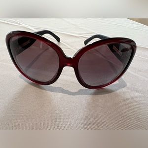Chanel Sunglasses with burgundy frame. “Blue Jean” fabric on sides w/ CC